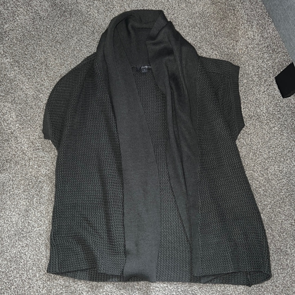 Short sleeve, small brown cardigan.
